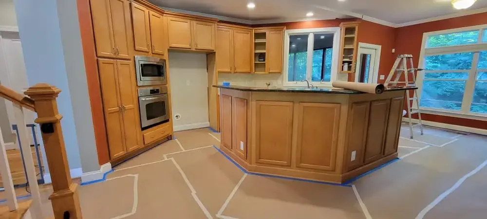 Warm white cabinets with a UV-protective clear coat.