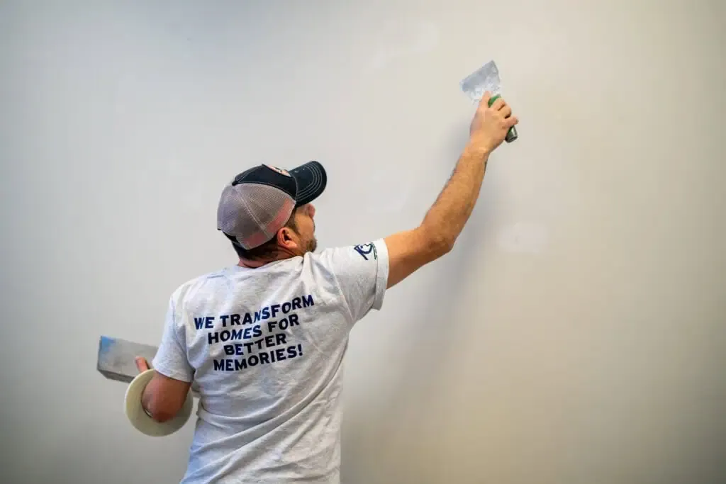 Water damage drywall repair — seamless patch and repaint.
